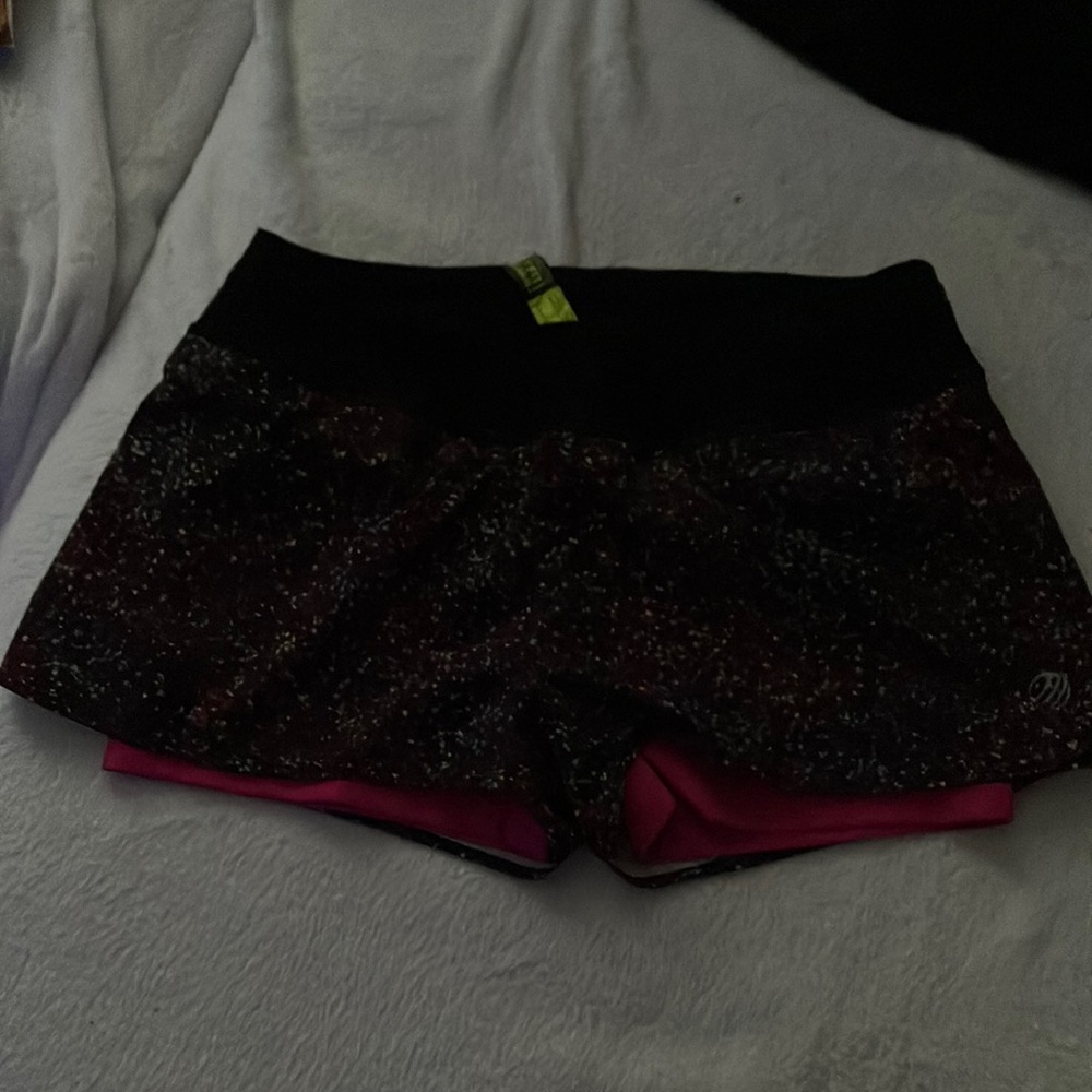 The shorts have a spandex liner and a polyester outside.